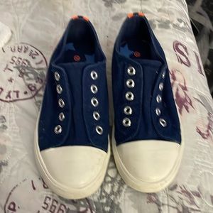 Boden laceless blue tennis shoes.